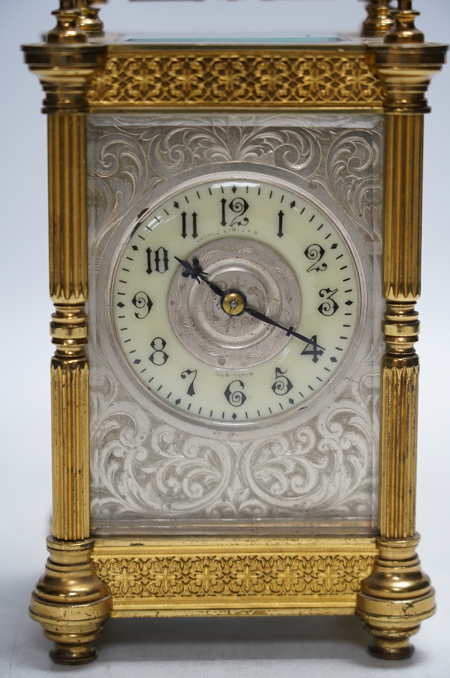 A late 19th French pierced brass cased eight day carriage timepiece, with key, 17cm. Condition - side panel cracked, not tested as working